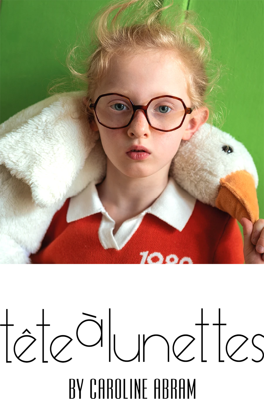 tête à lunettes